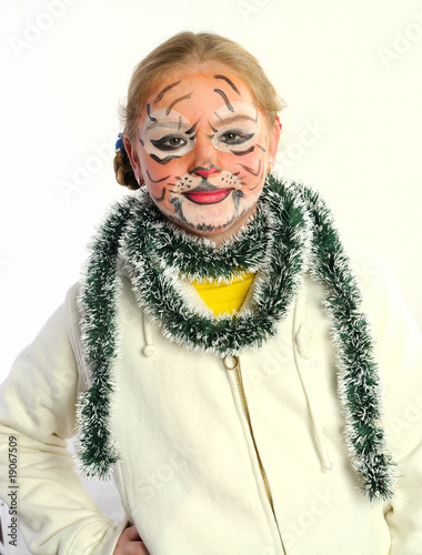 Fotografie Girl with drawing by mask tiger