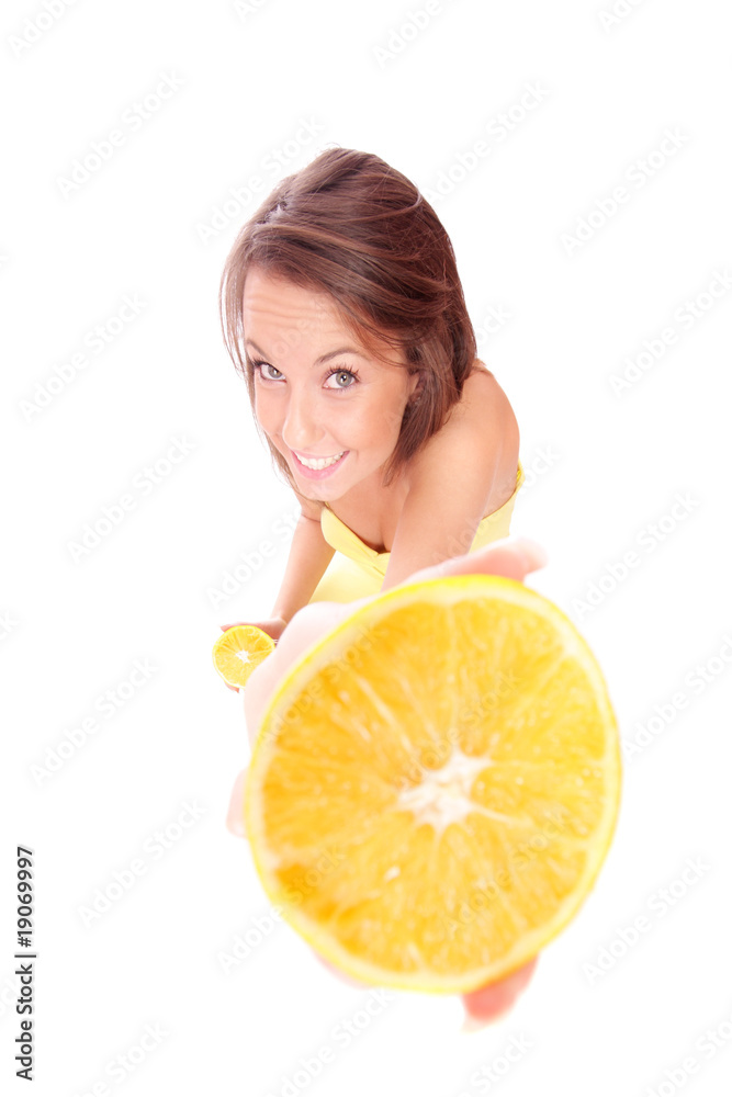 happy model eating an orange