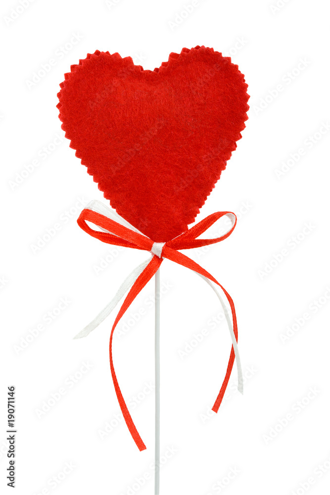 Valentines heart on a stick with red and white ribbons, isolated Valentines heart on a stick with red and white ribbons, isolated