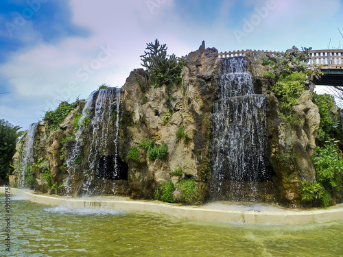 Waterfall and bridge in the park Genoves of Cadiz, Andalucia photo