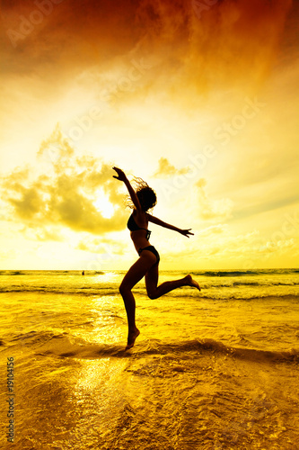 The jumping girl on a tropical beach © Kushch Dmitry