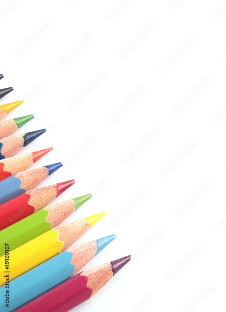 Naklejka premium color pencils close-up isolated on white background