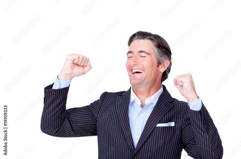 Successful businessman punching the air in celebration Successful businessman punching the air in celebration