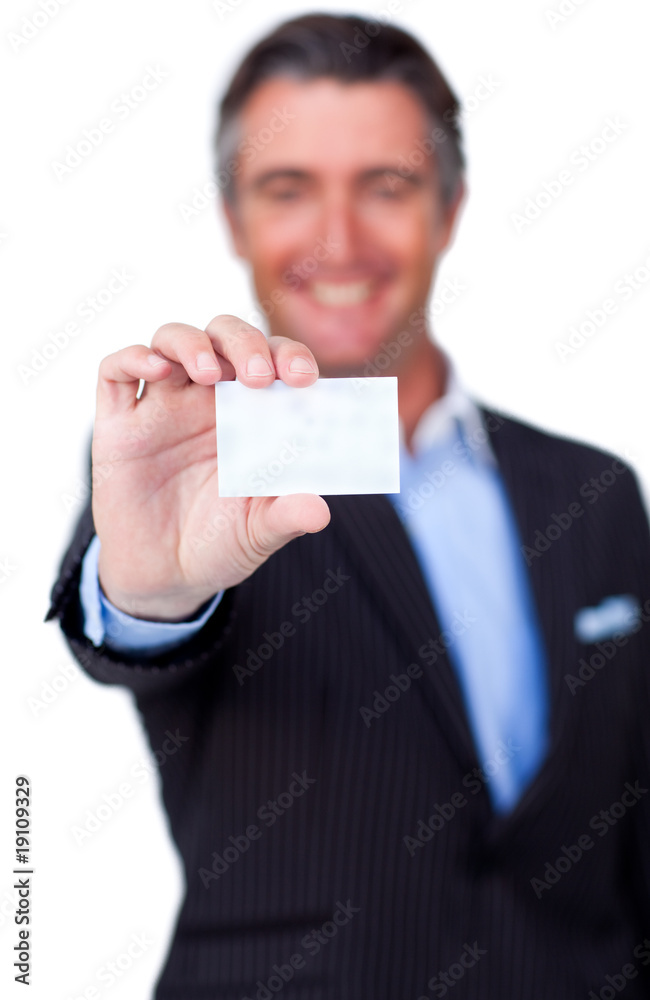 Smiling businessman holding a white card