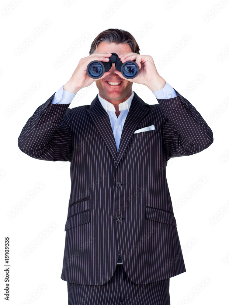 Smiling businessman looking through binoculars Smiling businessman looking through binoculars