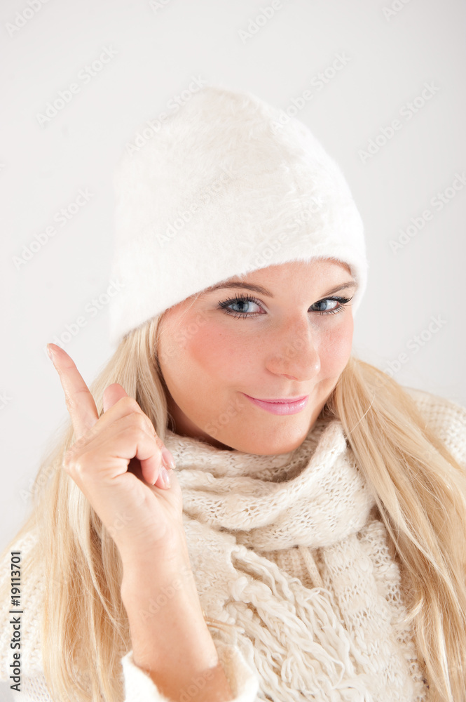 Obraz premium young beautiful winter woman in hat and scarf