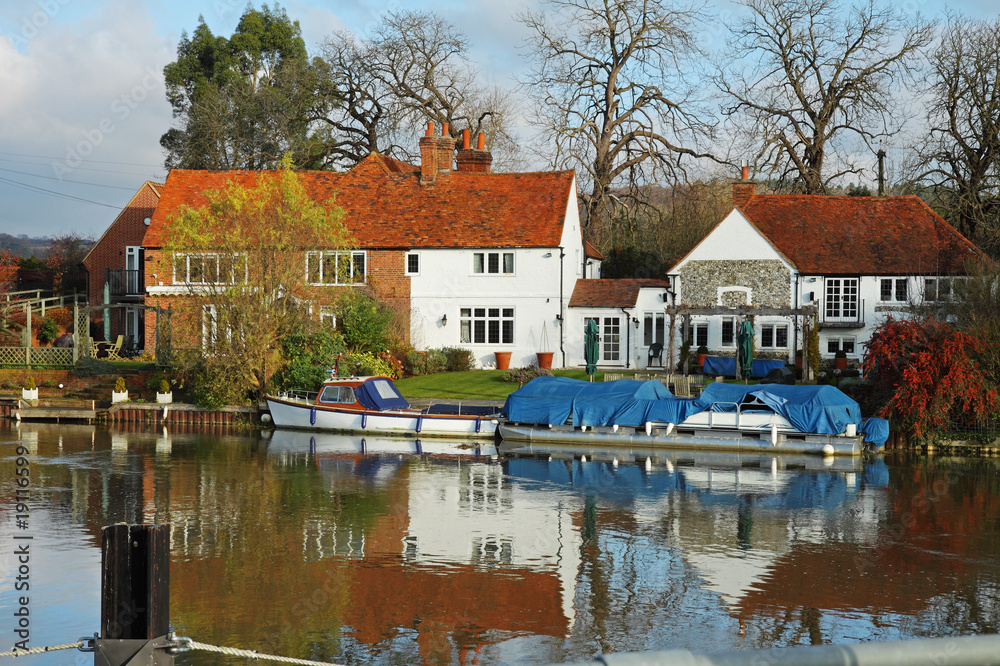 Traditional English Riverside House in early Winter Traditional English Riverside House in early Winter