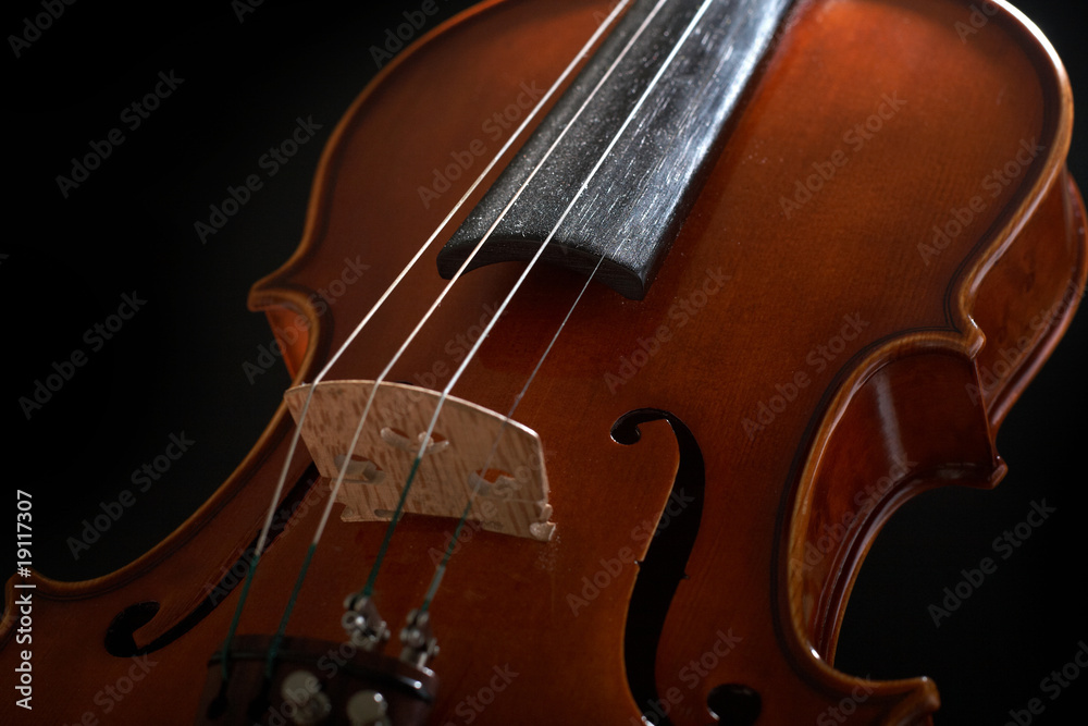 Fototapeta premium vintage violin over dark background