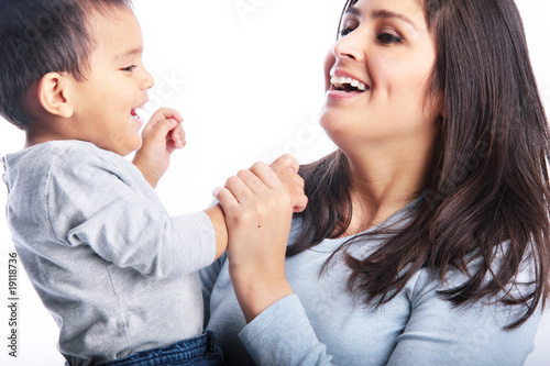 Mother & toddler son playing & laughing