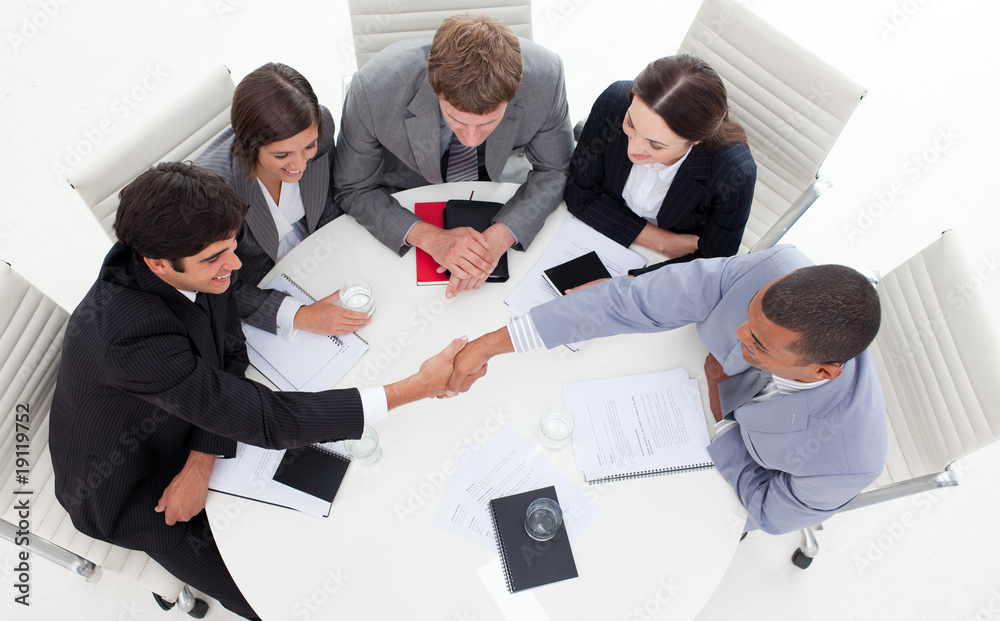 Fototapeta premium Successful international business people shaking hands