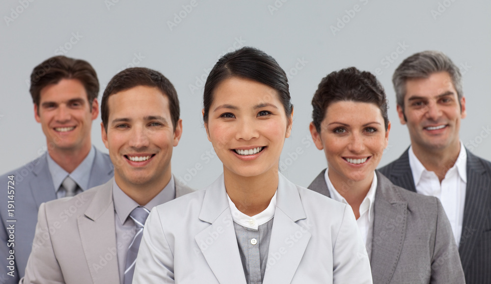 Multi-ethnic business people standing together Multi-ethnic business people standing together