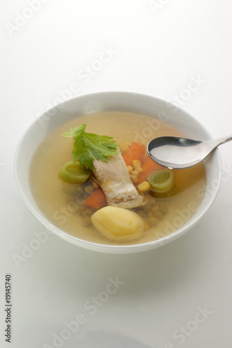 carp fish soup with fresh organic herbs