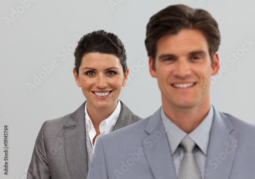 Happy Business associates standing in a line
