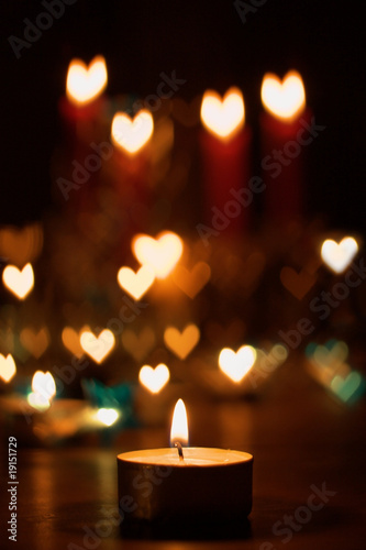 Candles and heartshaped bokeh