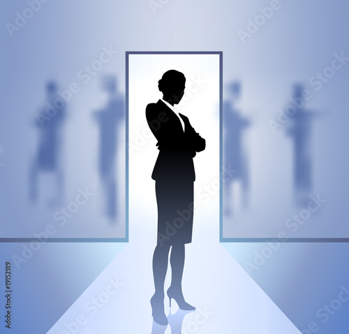 Businesswoman executive in focus on blurry background