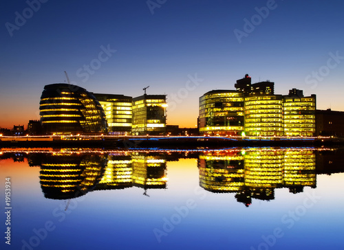 Office buildings on the bank of Thames River photo