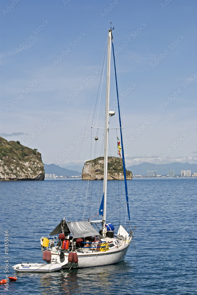 Sailing yacht in a Pacific Ocean bay