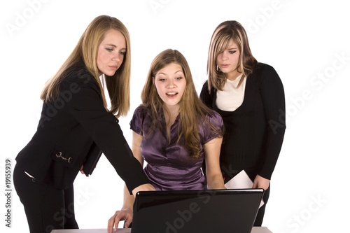 woman piointing at screen for others photo