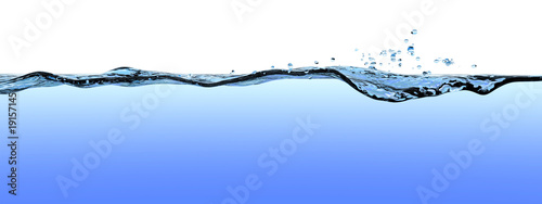 Water surface with waves, ripples, and drops.