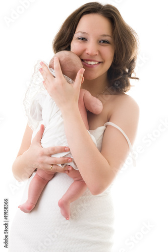 Smiling mother with baby girl