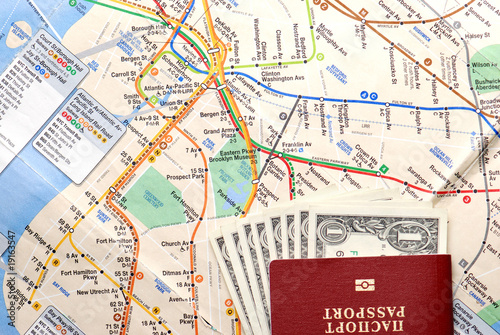passport with the money on a map