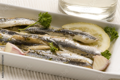 Spanish tapas. Marinated fresh anchovies. Boquerones en vinagre.