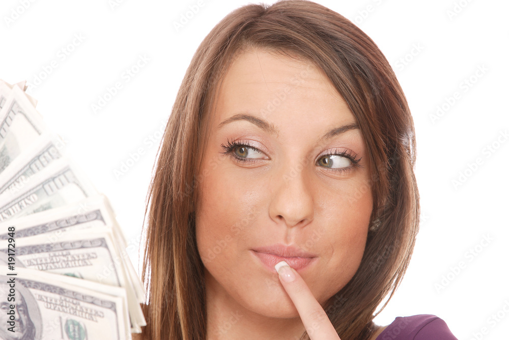 Attractive woman takes lot of 100 dollar bills Attractive woman takes lot of 100 dollar bills