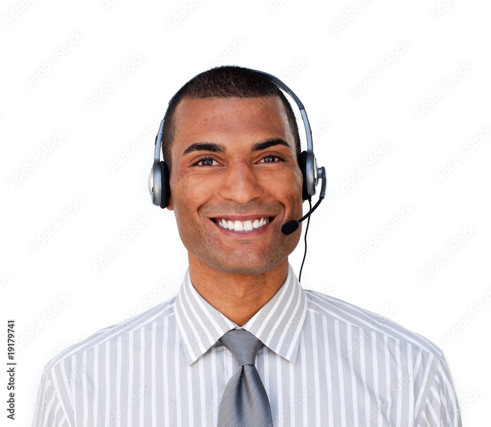 Attractive ethnic businessman with headset on Attractive ethnic businessman with headset on