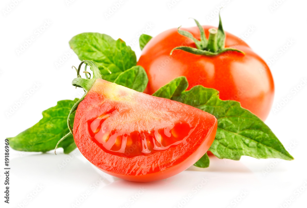 fresh red tomato with cut and green leaves isolated fresh red tomato with cut and green leaves isolated