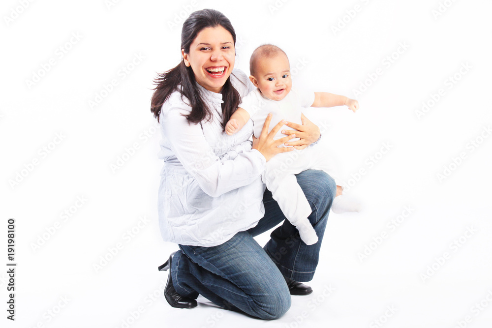 Happy laughing mom holding baby infant son isolated Happy laughing mom holding baby infant son isolated
