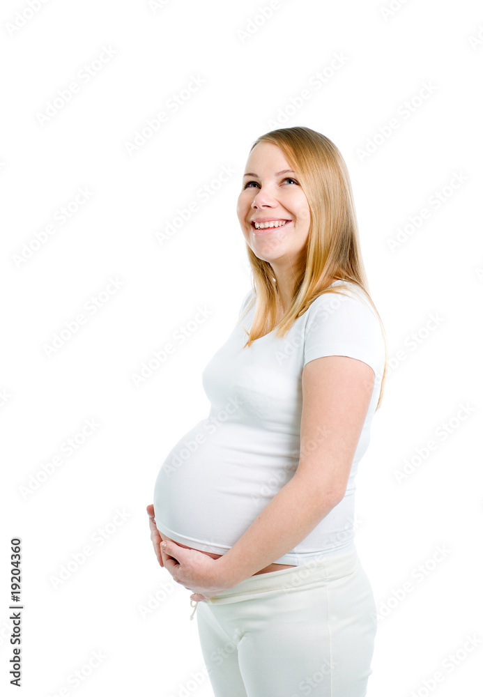 Beautiful  pregnant blonde woman in studio sho