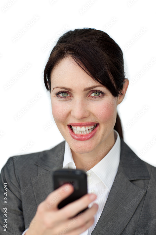 Enthusiastic businesswoman sending a text Enthusiastic businesswoman sending a text