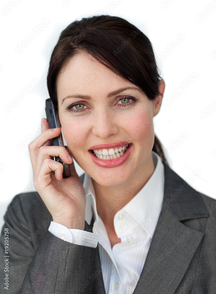 Captivating businesswoman using a mobile phone Captivating businesswoman using a mobile phone