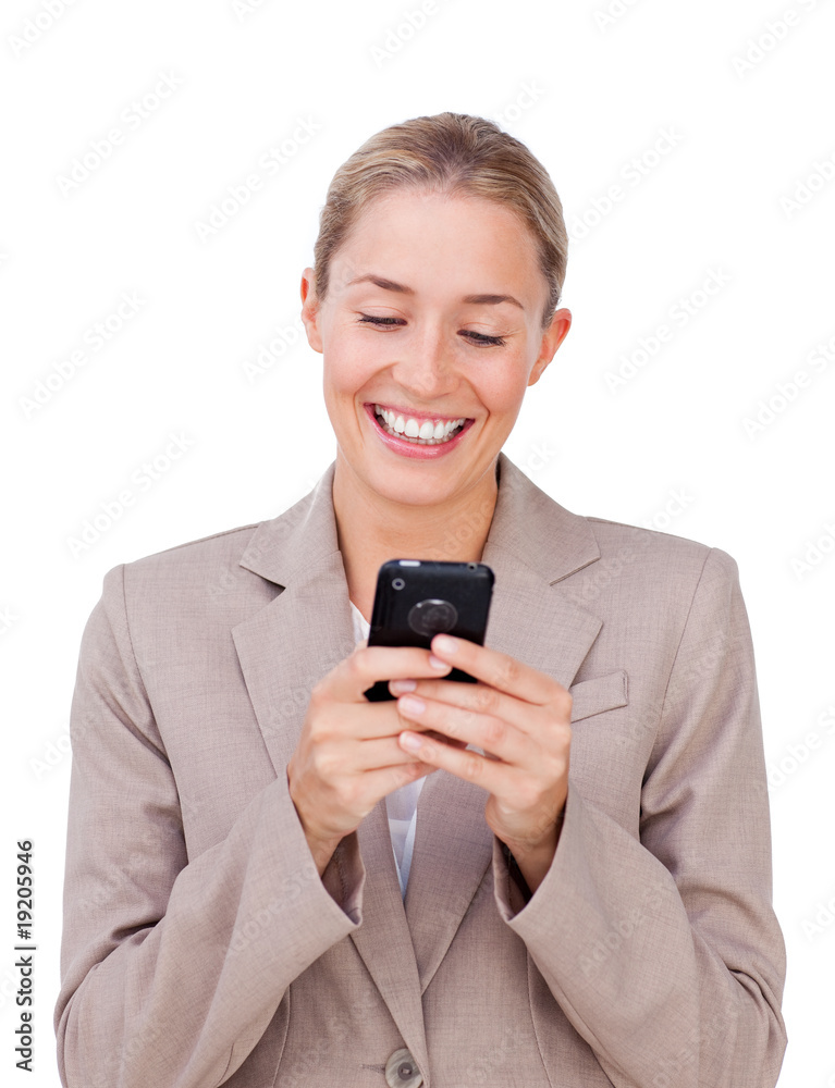 Elegant businesswoman sending a text Elegant businesswoman sending a text