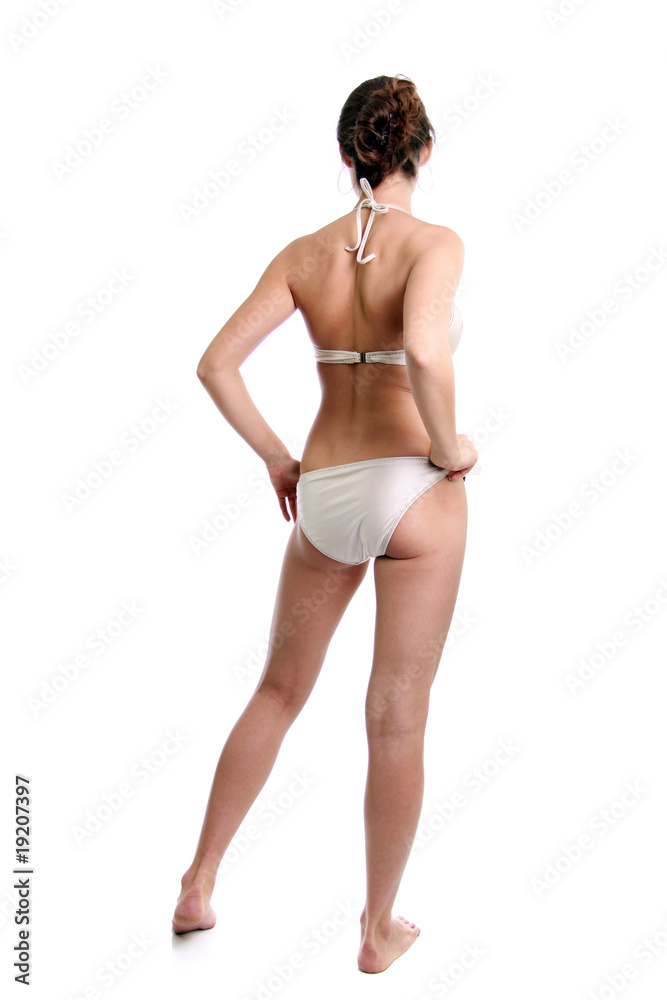 Fototapeta premium young woman in bikini, isolated on white background