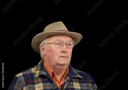 capture of a senior male portrait with glasses