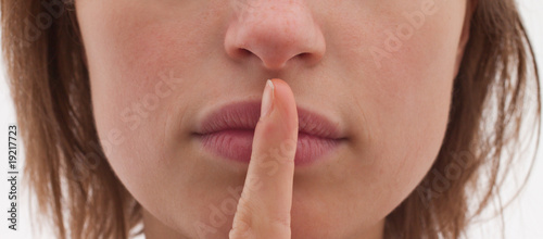 Shh - Cut out of woman with finger to lips