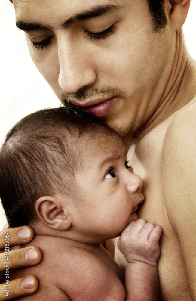 © gwimages - Hispanic father and son