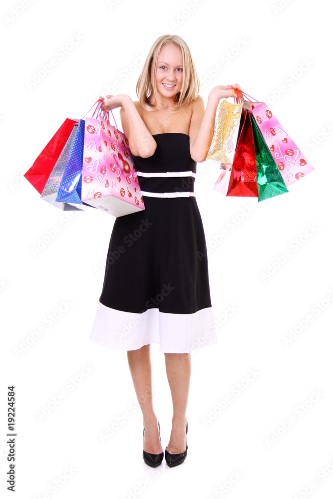 Shopping woman smiling. Isolated over white background Shopping woman smiling. Isolated over white background