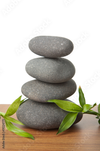 grey spa stones and leaves isolated