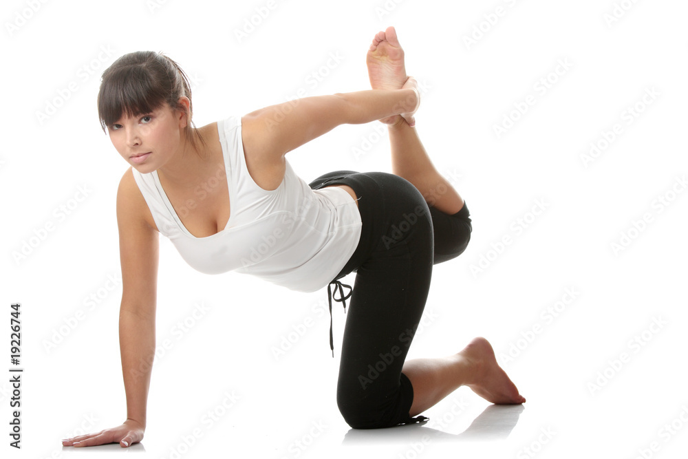 Naklejka premium Beautiful young woman doing exercise