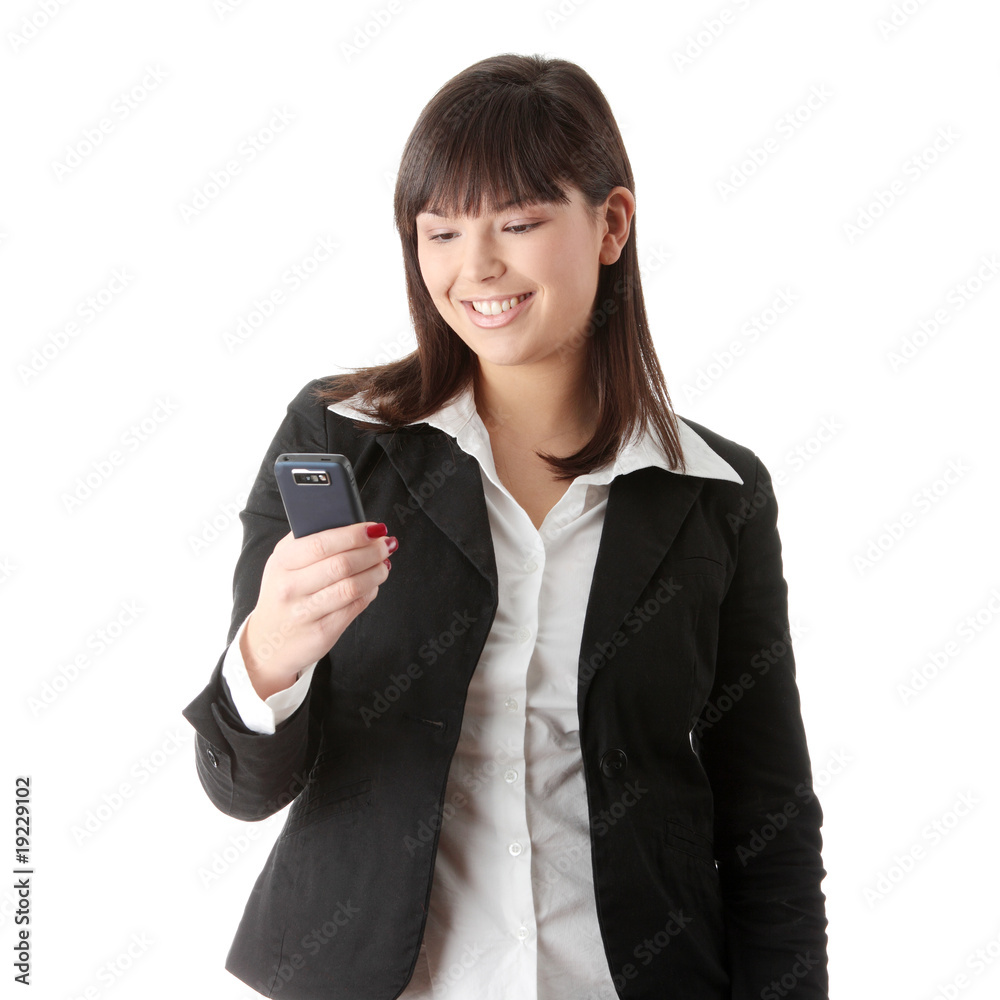 Young businesswoman using cell phone Young businesswoman using cell phone