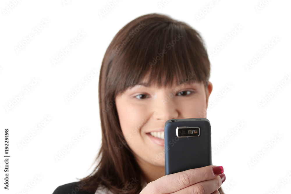 Young businesswoman using cell phone Young businesswoman using cell phone