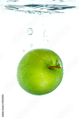 An apple falling in water