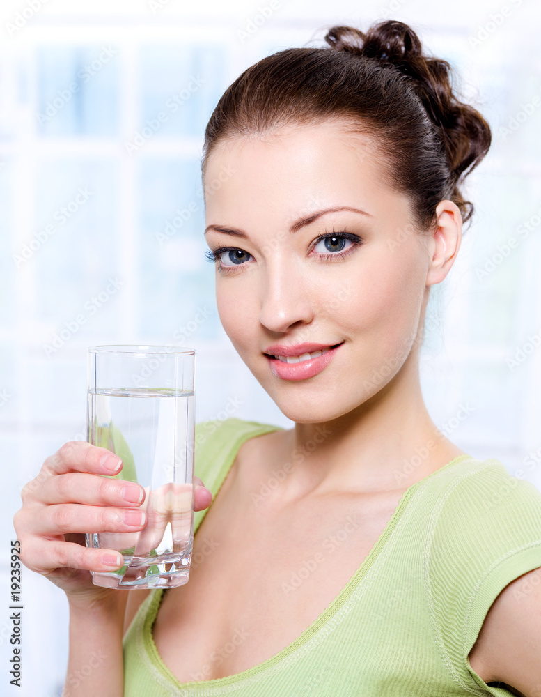 beautiful young woman with glass of pure water beautiful young woman with glass of pure water