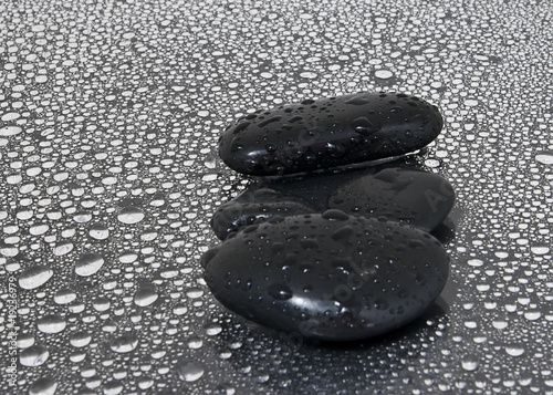 Canvas Print Black stones with water drops