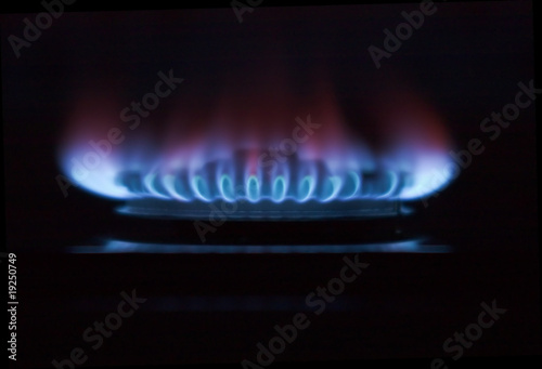 gas cooker ring flaming in the darkness