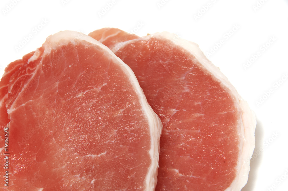 a pork chops isolated on white background a pork chops isolated on white background