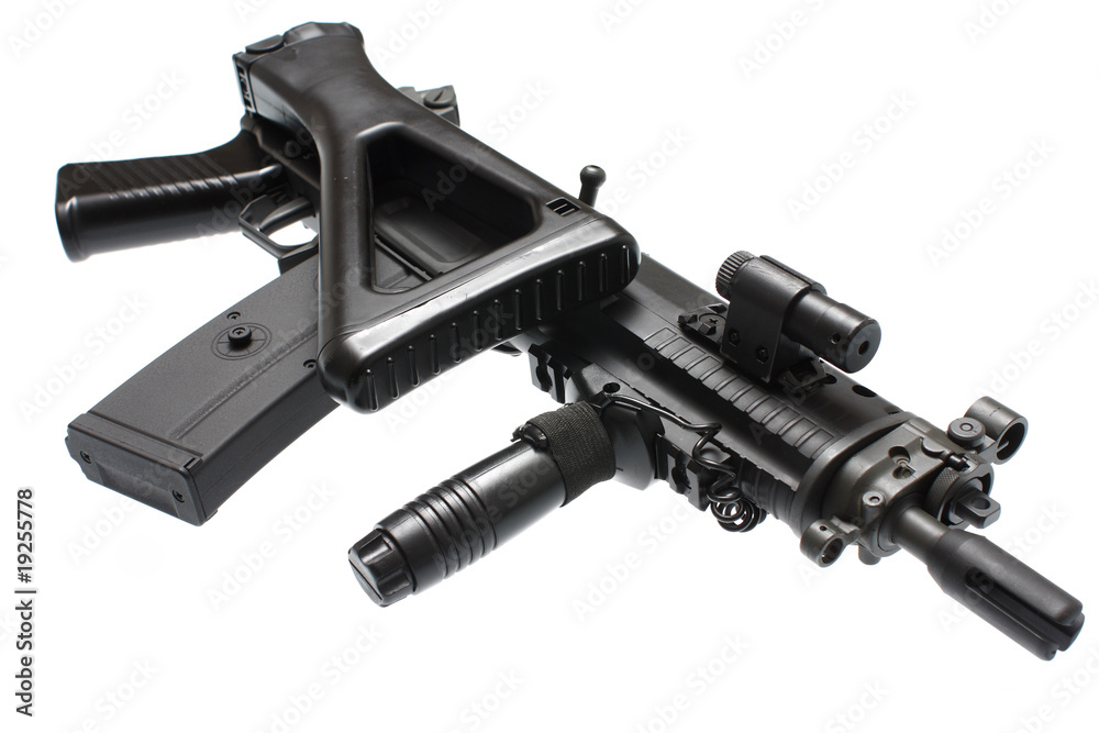 An assault rifle with a folding stock. An assault rifle with a folding stock.
