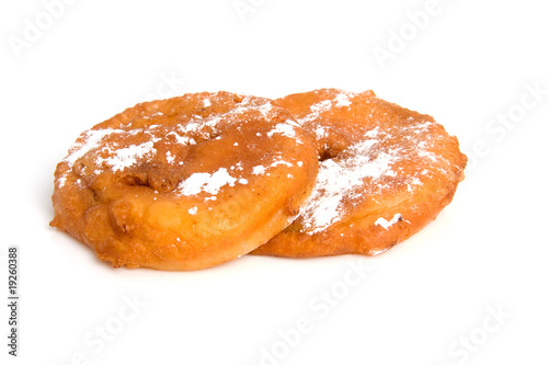 Photography two home bakes apple fritter over white background